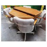 11 - ROUND WOOD TABLE W/ SWIVEL FABIC CHAIRS
