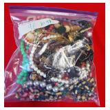 11 - LOT 47 ESTATE BAG OF COSTUME JEWELRY