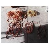 11 - LOT OF LONG DURABLE EXTENSION CORDS