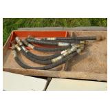 assorted industrial hydraulic hoses