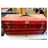 Red tool box with assorted tools