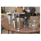 large pots w steamer baskets