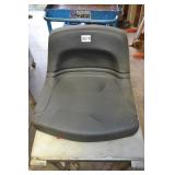 Unused lawnmower seat