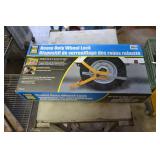 Unused heavy duty wheel lock kit in box