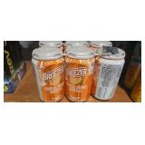 Six cans Breezer tropical Orange