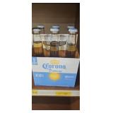 Six bottles Corona Sun Brew