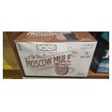 Six cans Moscow Mule boxer
