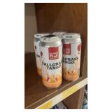 Four cans banded peak brewing, tallgrass, tango,