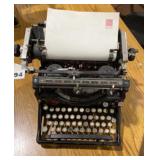 Vintage Underwood Typewriter with book & ribbons