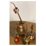 4 vintage oil cans may contain product