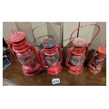 A collection of four lanterns