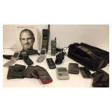 Box of Assorted Cellular Phones & Steve Jobs book