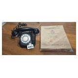 Vintage rotary phone and 1957 calgaryen district