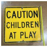 Heavy metal caution children at Play sign