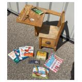 Vintage wooden school desk with books and