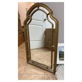 Mirror with golden wooden frame