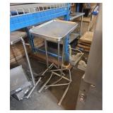2 stainless steel surgical tables