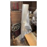 One roll of 50 inches plastic wrap with holder
