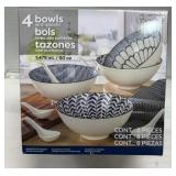 Four bowls set with spoons