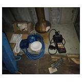 Shelf of miscellaneous including lighting and a