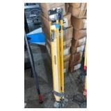 yellow aluminum surveying tripod