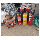 Seven fire extinguishers five are full