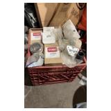 A crate of assorted oil filters