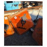 2 motorcycle caution signs