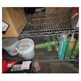 Shelf of miscellaneous liquid nail older stock
