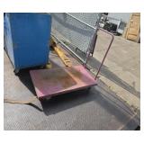 Four wheel dolly with handle