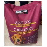 Open bag of dog food.