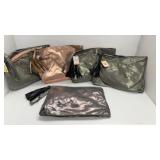Womanï¿½s makeup/purse  bags 5 of them