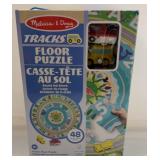 $20 Melissa and dough tracks floor puzzle