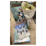Bag Of Flowers And Christmas Shopping Bag
