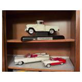 2 model cars: Welly #2432 1955 Oldsmobile and Maisto 1959 Cadillac (made in Thailand) and 1955 Chevy 3100 Cameo truck w/base