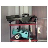 Pressed steel dump truck and Ny-Lint toys 2 wheeled trailer