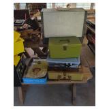 Vintage Royal swing machine #133 in case, 3 sewing accessory boxes with accessories and vintage appliance guides