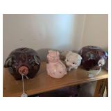 Two 5" Hull piggy banks, Norcrest piggy bank and unknown piggy bank