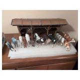 Barnyard animals and stable