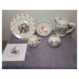 Royal Doulton Bunnykins collection: bowl, jug, coin bank, clock and mug and Beatrice Potter Peter Rabbit tile