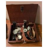 Vintage watches in wooden box