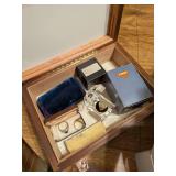 Jewelry in wooden box: rings, bracelet, pocket knife, necklace and watch
