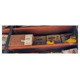 Two Shelves of Auto Magazines and Engine Oil