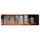 Shelf of Auto Manuals, Transmission Fluid, and Engine Oil