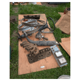 Vintage Vehicle Rims, Steering Column, Engine Parts, and Vacuum Gauge Unit