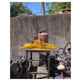 Metal Table and Gas Cans