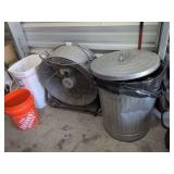 Fan and Two Trash Cans