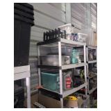 Shelf and Contents: Lighting, PVC Pipes, and More