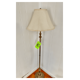 Brass Floor Lamp With Beige Fabric Shade and Fluted Base