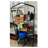 Garden and Decorative Items on Metal Shelving Unit